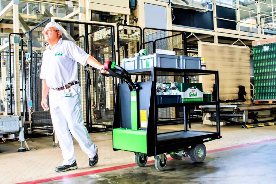 ručně vedený elektrický tahač (plošinový vozík) movexx tt1000-f, manipulace nákladu v potravinářském průmyslu